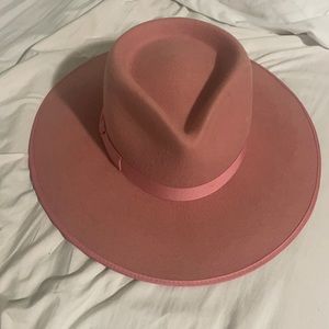 Lack of color hat rose rancher